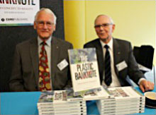 David Solomon and Tom Spurling with a copy of their new book
